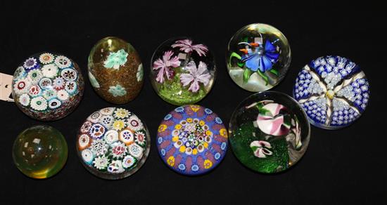 A collection of nine paperweights